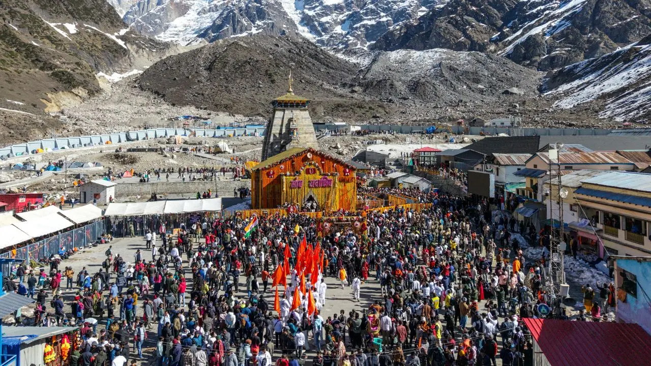 Devotees throng the Kedarnath Jyotirlinga Temple during the portals' opening ceremony, in Rudraprayag. Pic/PTI